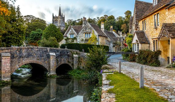 small English village with a river and bridge